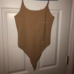 Never worn forever 21 bodysuit in beige